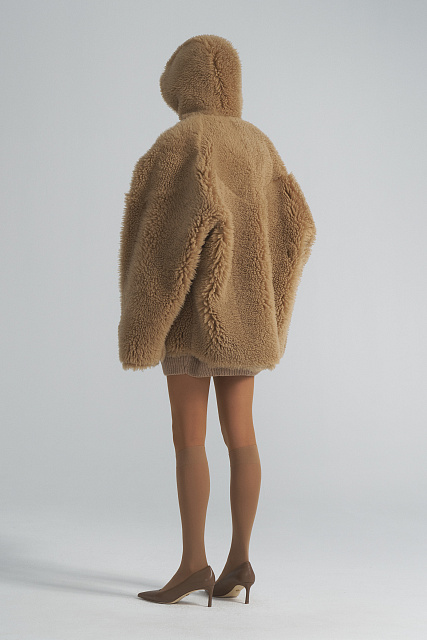 Double-sided sheepskin coat with a hood