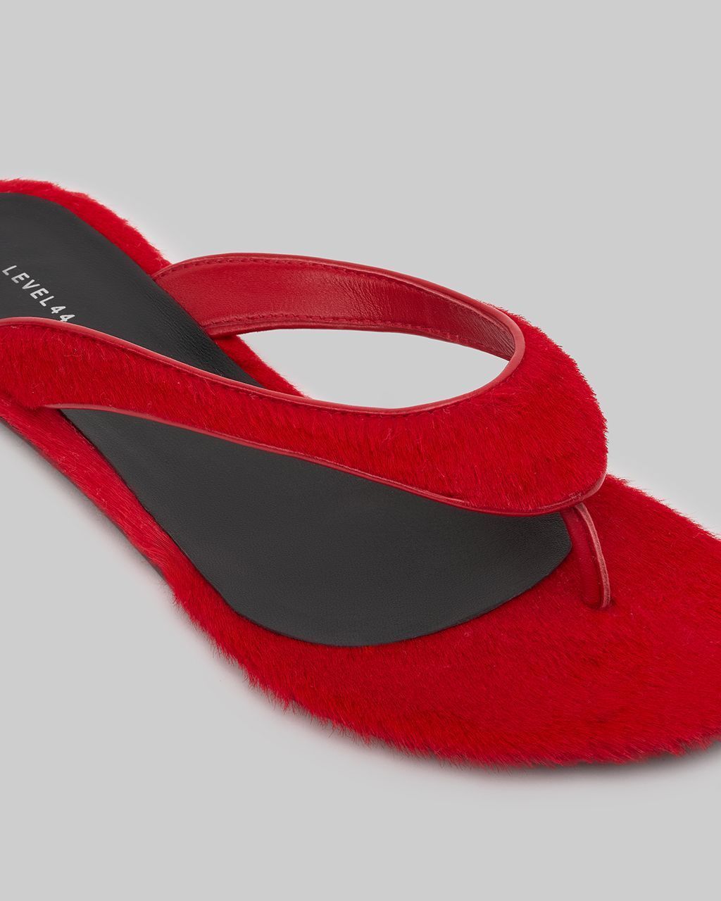 Molly pony fur flip flops