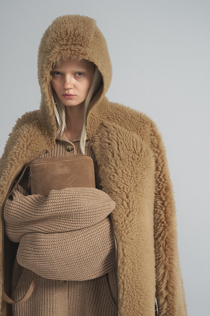 Double-sided sheepskin coat with a hood