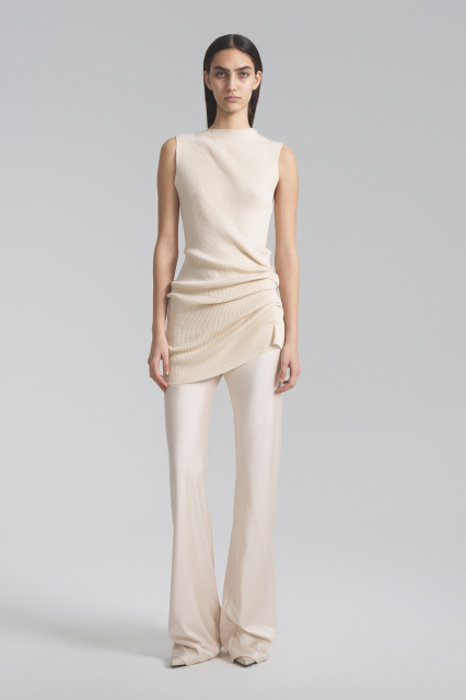 The vest dress is asymmetrical