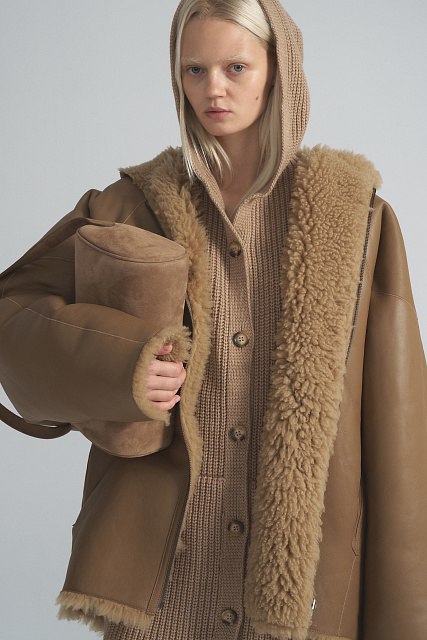 Double-sided sheepskin coat with a hood