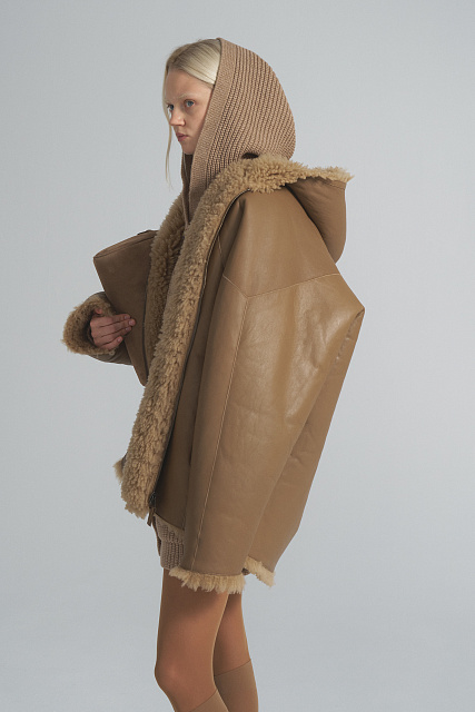 Double-sided sheepskin coat with a hood