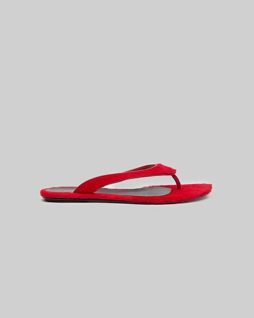 Molly pony fur flip flops