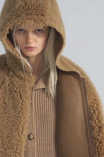 Double-sided sheepskin coat with a hood