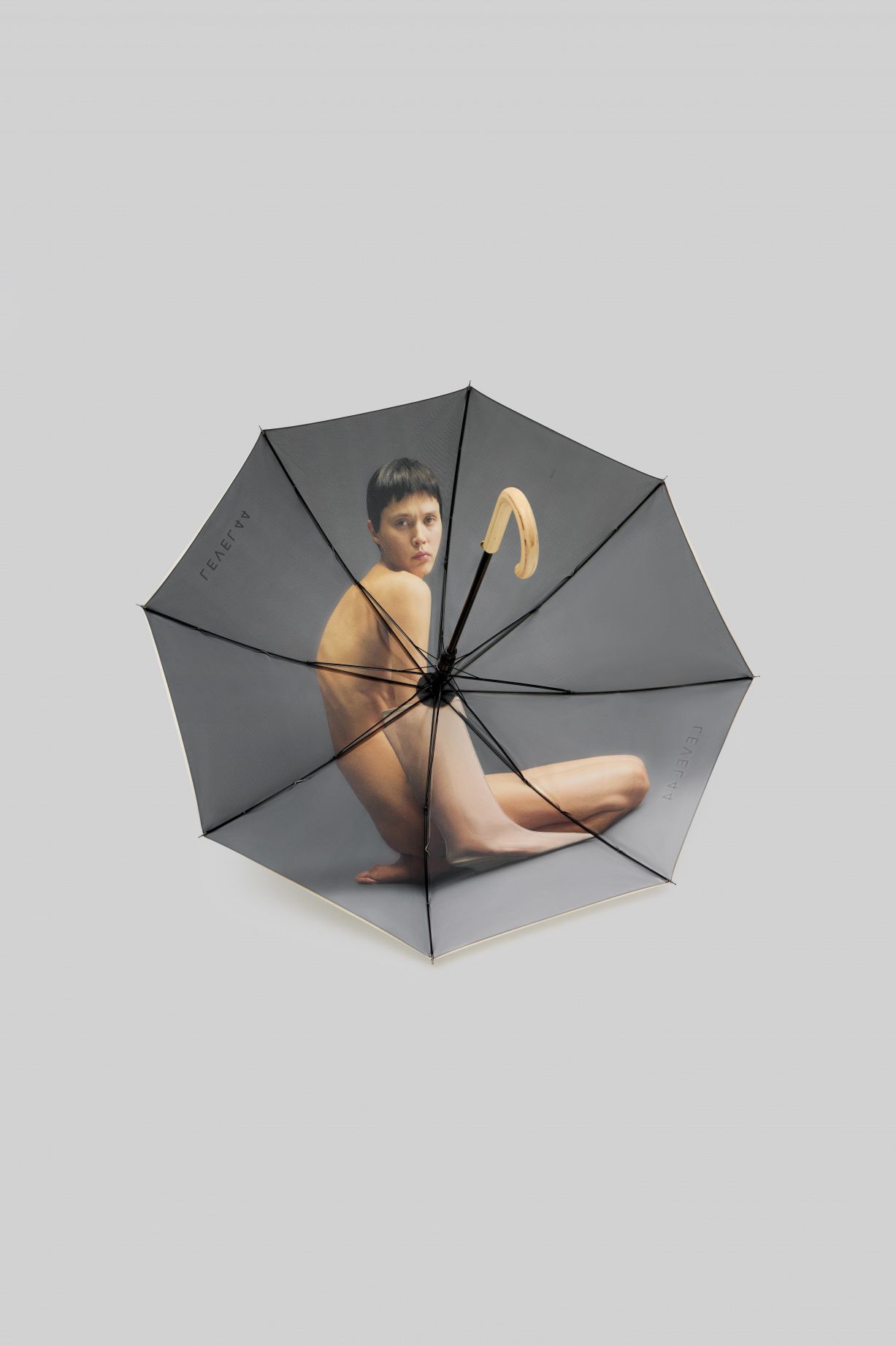 Walking umbrella with a wooden handle