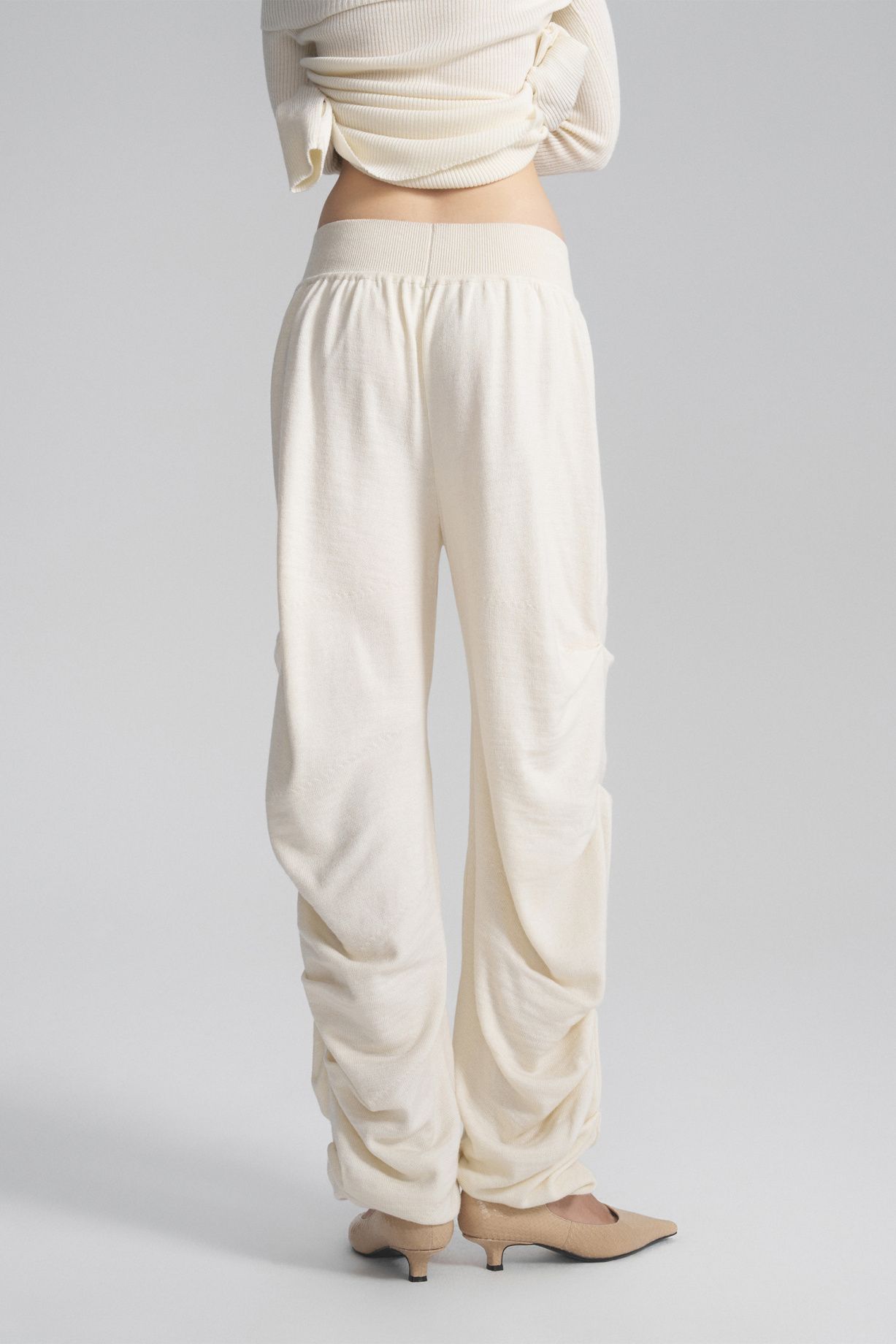 Брюки с защипами из мериносовой шерсти