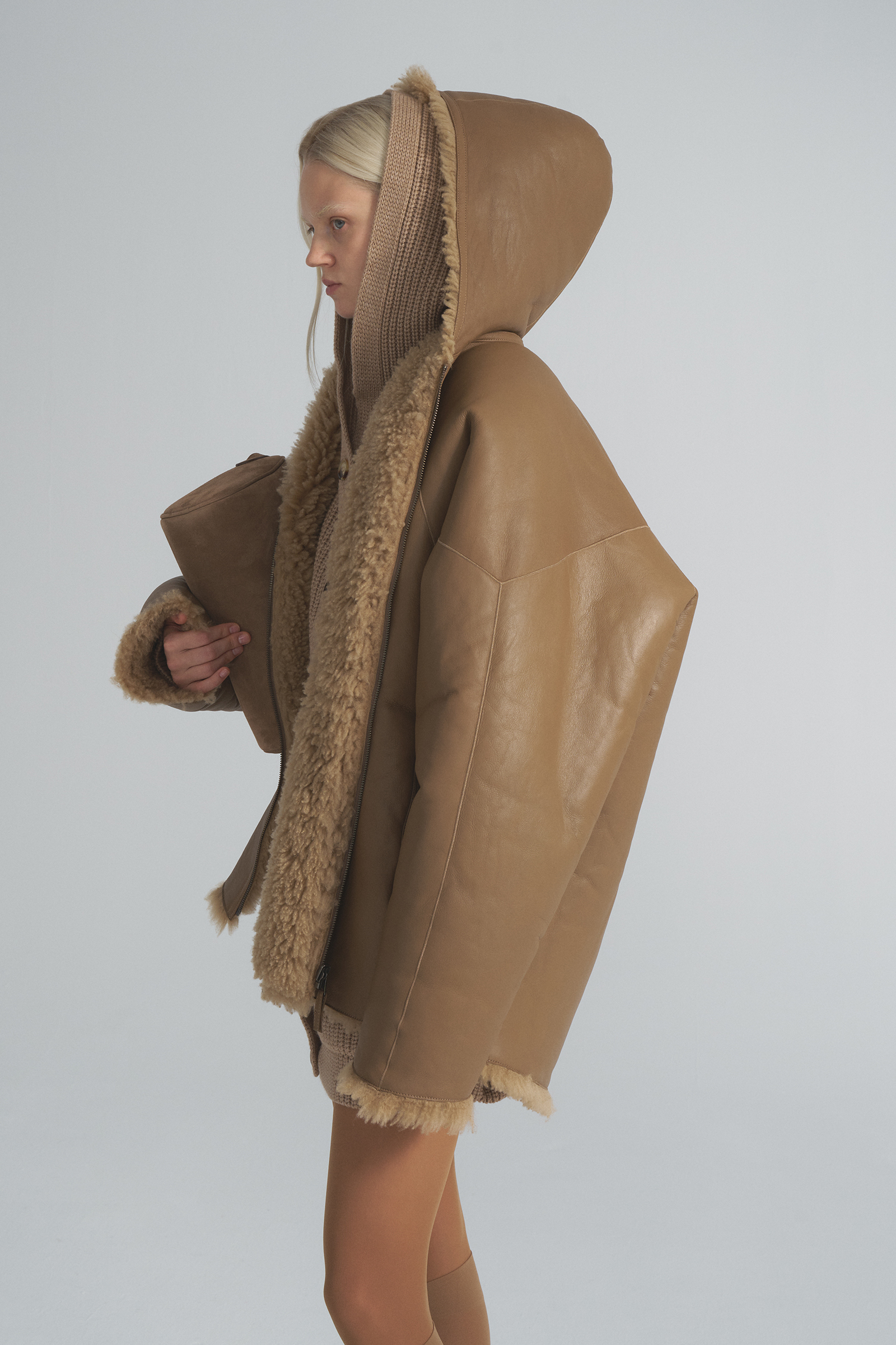 Double-sided sheepskin coat with a hood