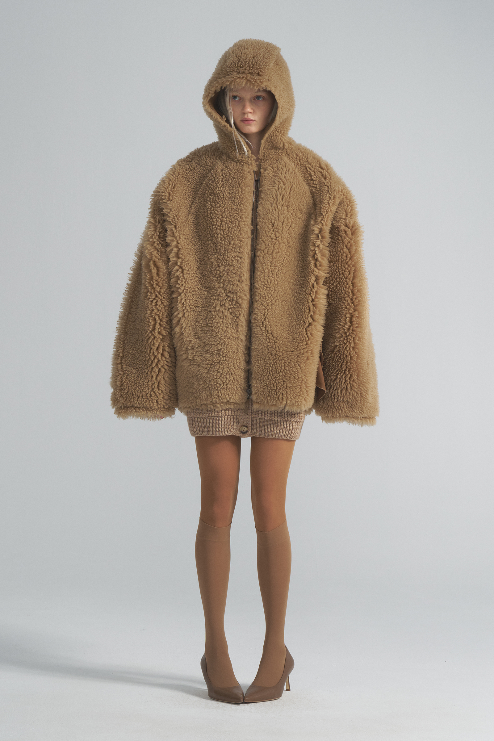 Double-sided sheepskin coat with a hood