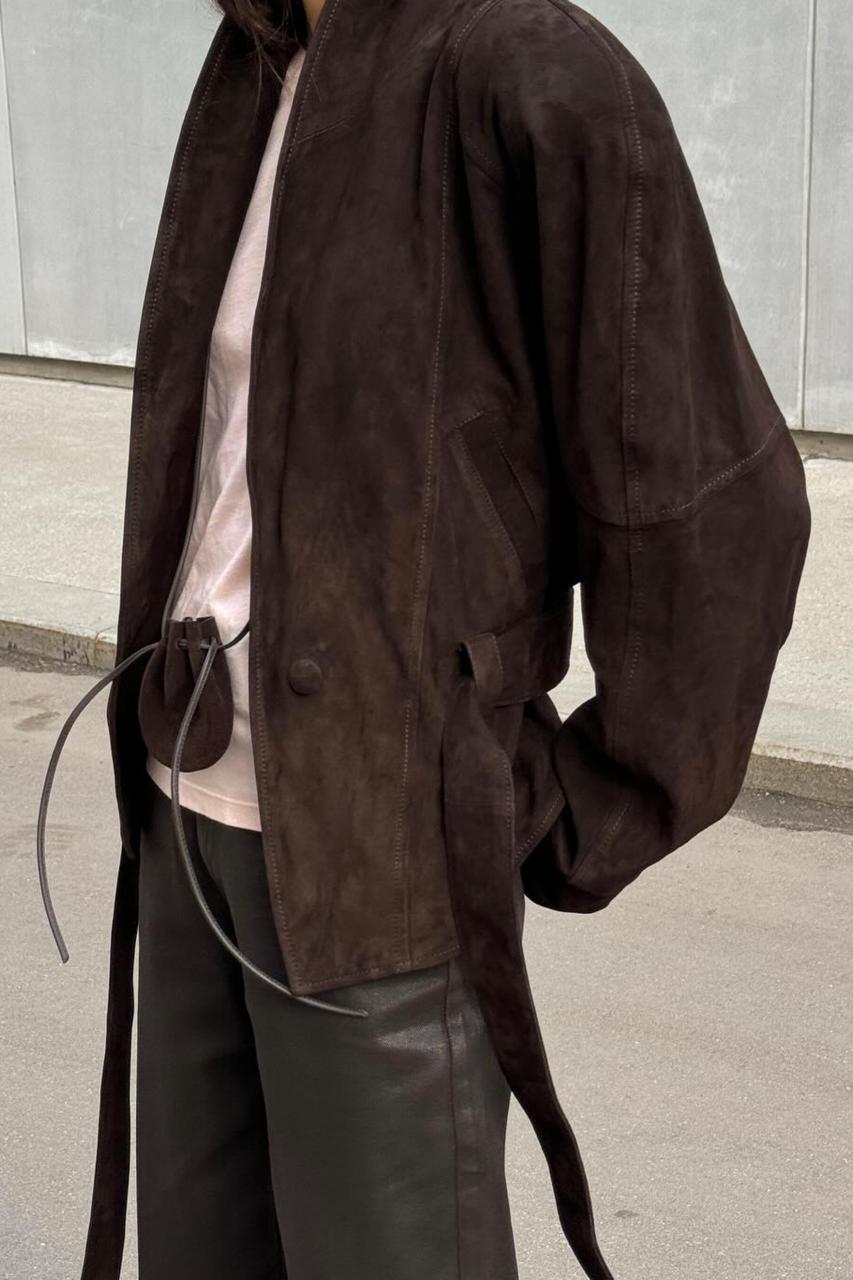 A suede jacket in the style of the 80s