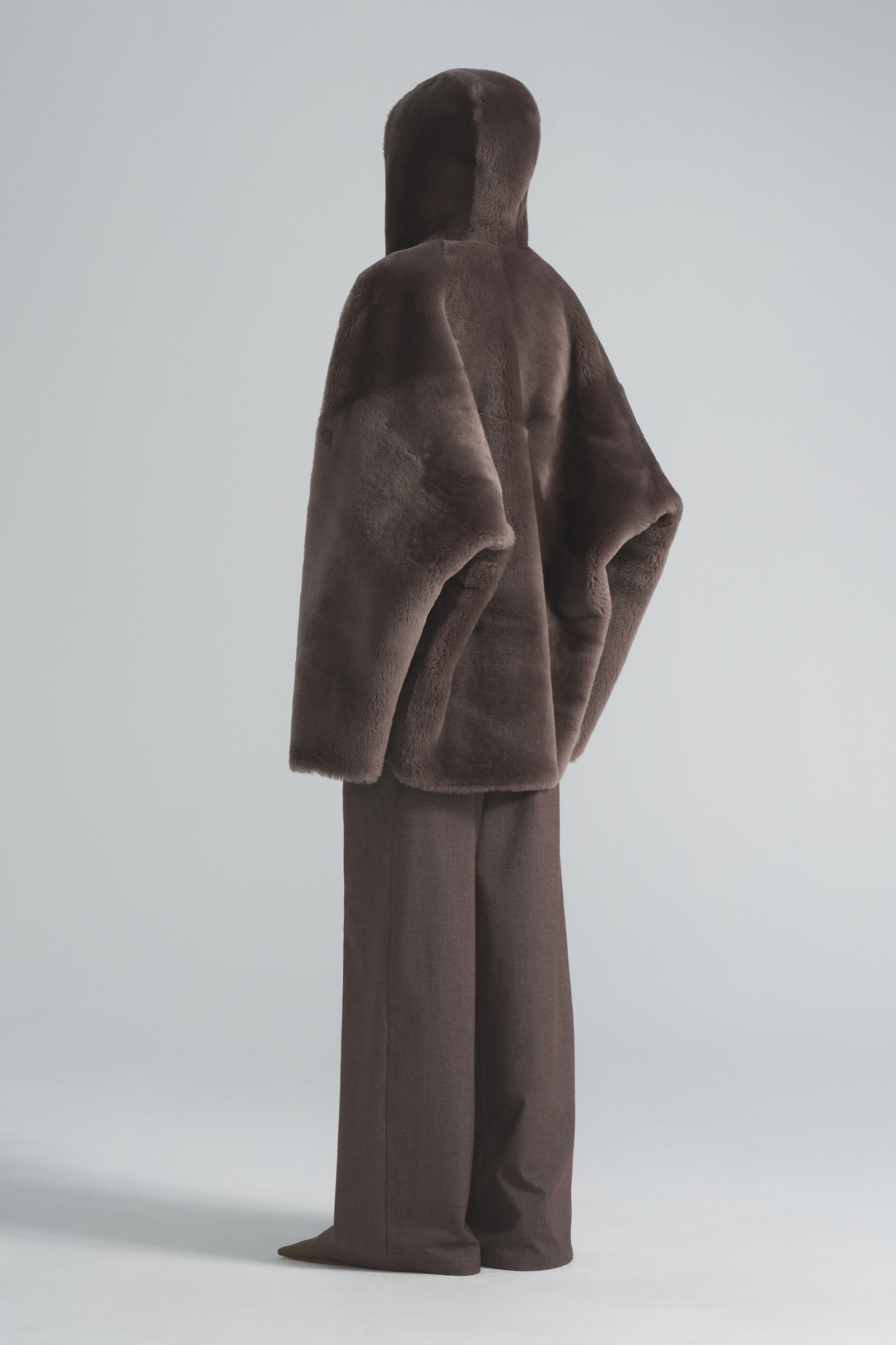 Double-sided sheepskin coat with a hood