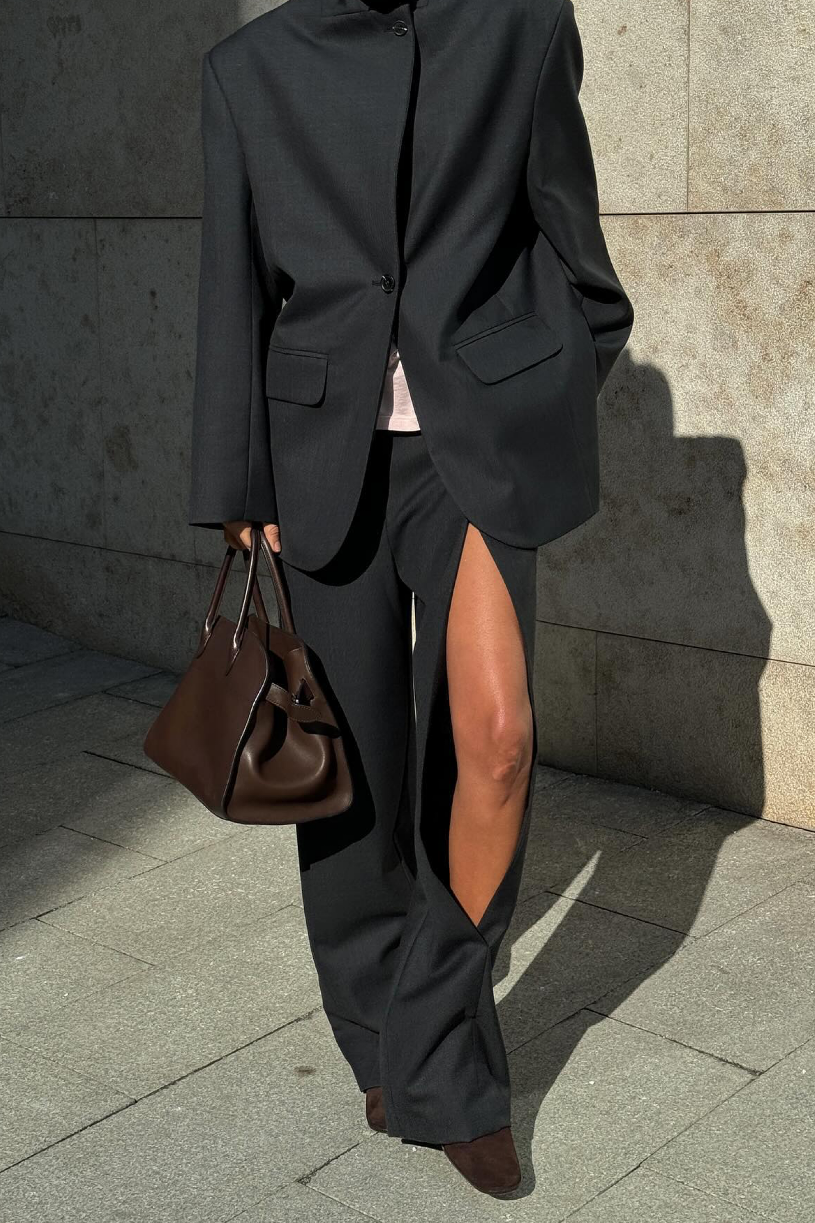 Trousers with a slit at the hip